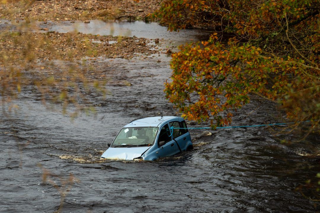 Driver of car that crashed into Highland river traced after search