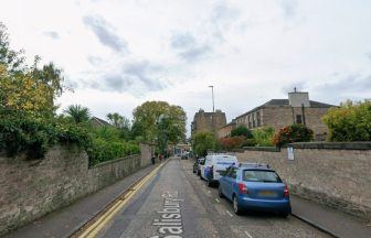 Four injured after marked police car crashes while responding to emergency in Edinburgh