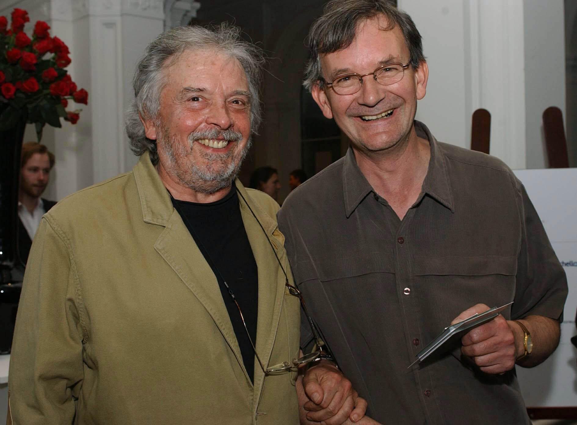 Photographers David Bailey and Martin Parr in 2004.
