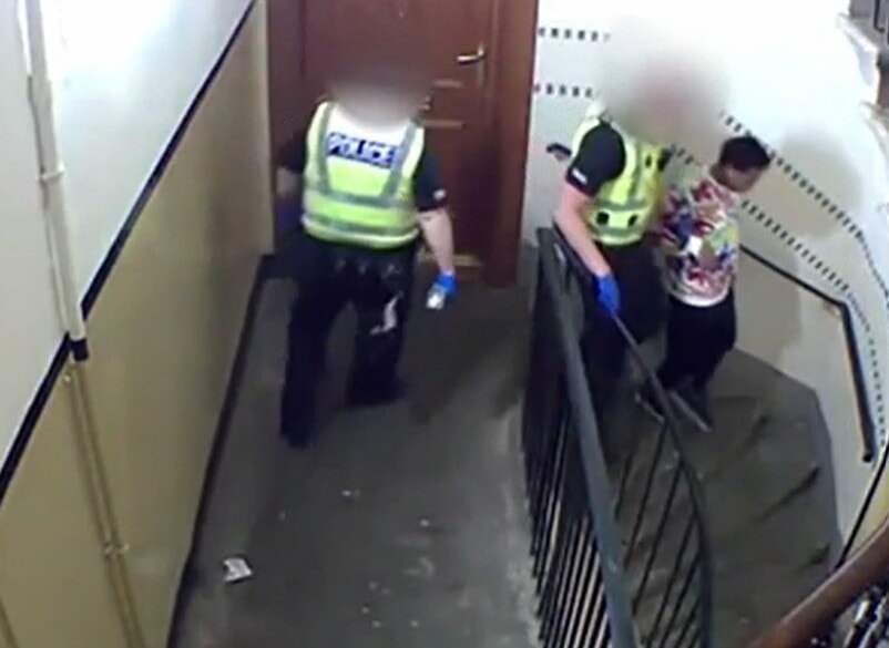 Sohail Ahmed being arrested by officers at his home