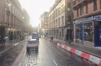 Fire crews descend on drain in Glasgow city centre after underground cable fire