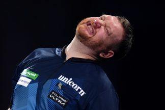Scots darts star Cameron Menzies punches drinks table after shock Worlds loss