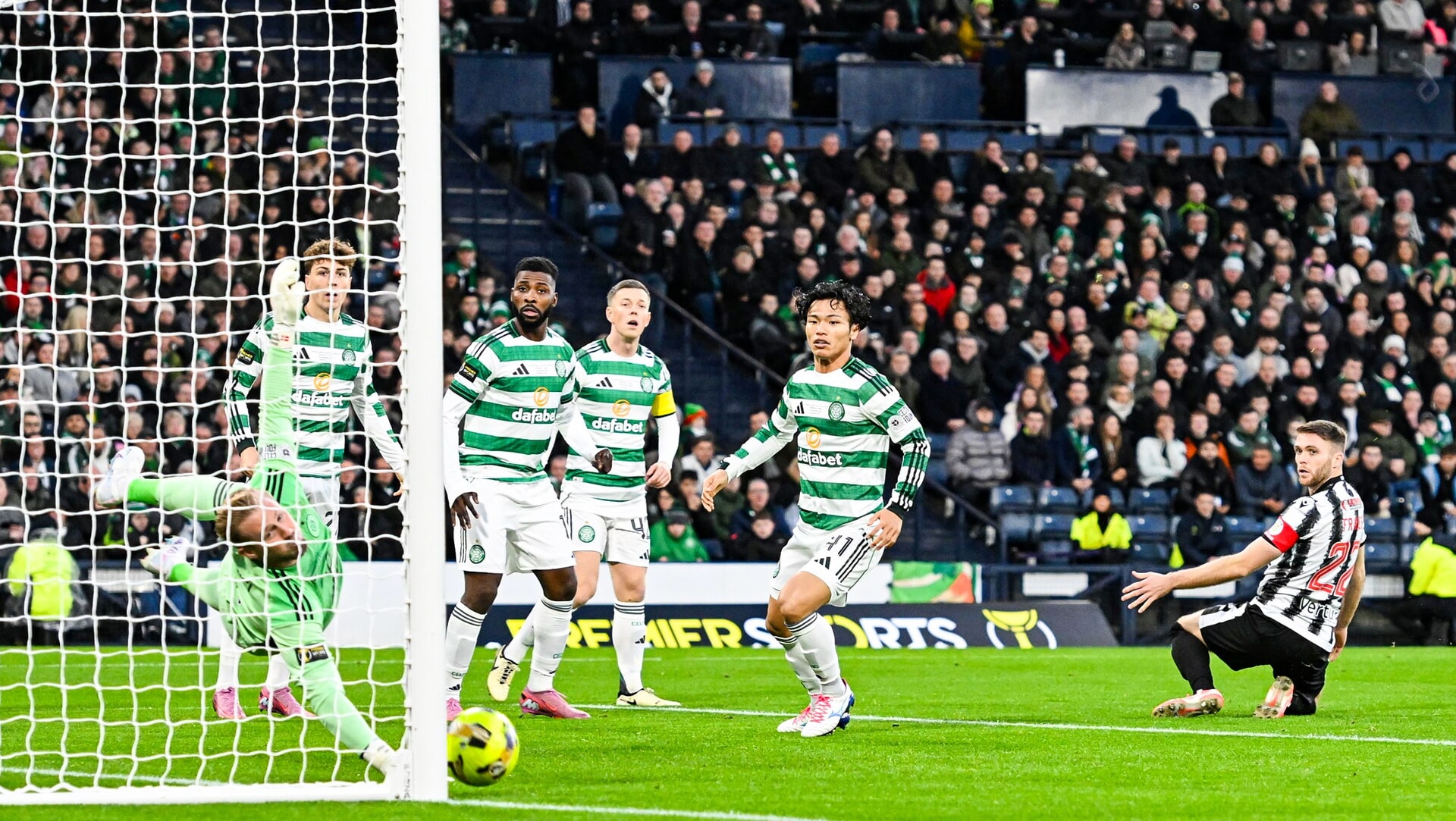 Golden moment: St Mirren's Marcus Fraser (R) scored in the second minute to put his side ahead against Celtic.