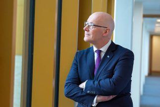 John Swinney faces FMQs after justice secretary survives no confidence vote