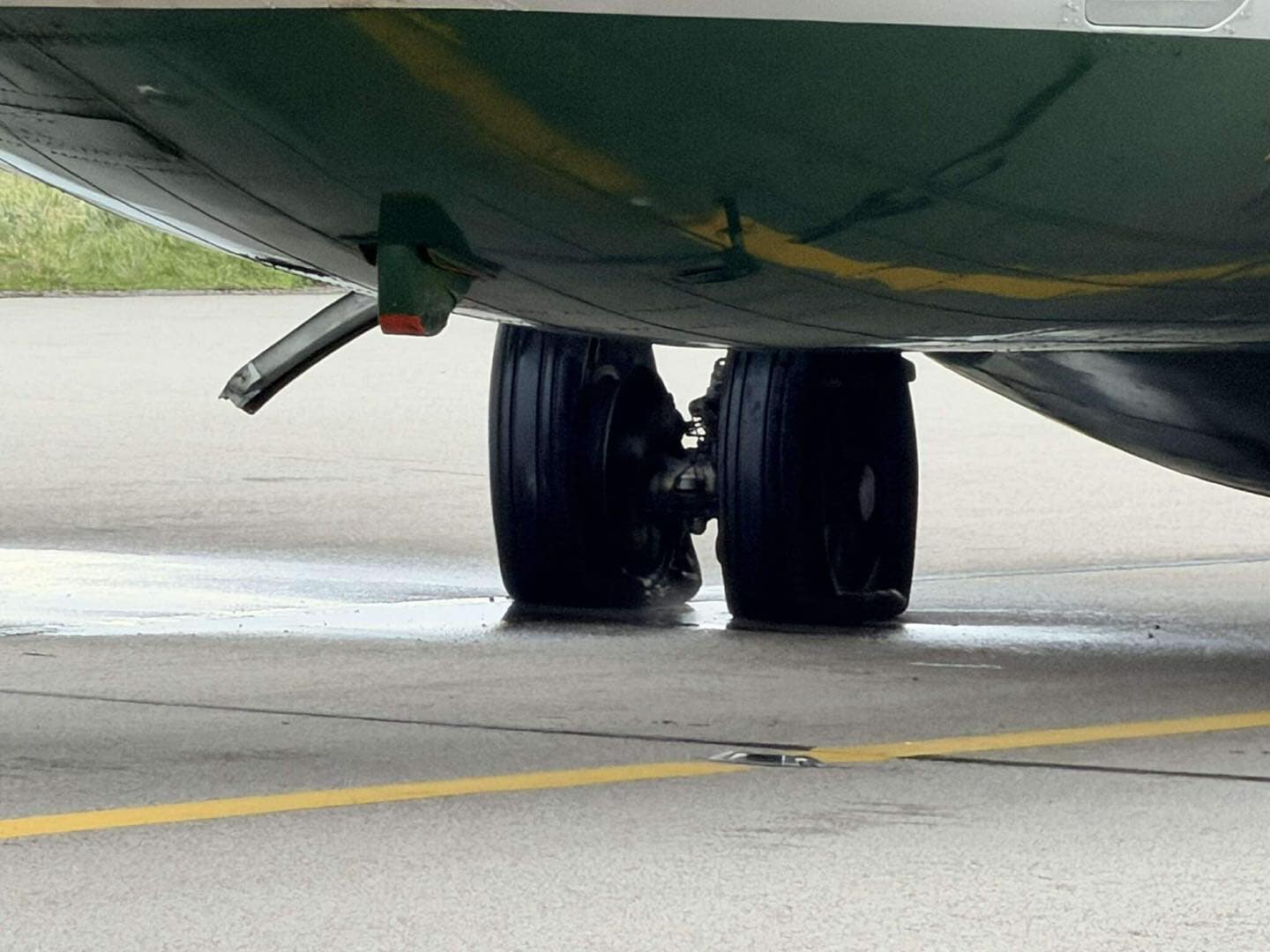 The airplane suffered a blown tyre on the runway.