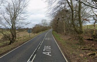 Elderly woman dies and three seriously injured following two-car crash on A706 near Carriber Mill