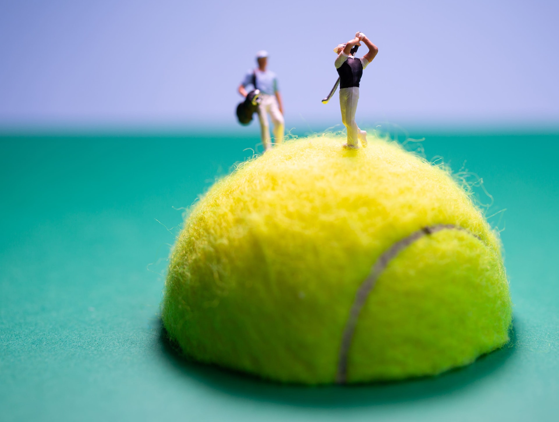 A golfer and his caddy mounted a tennis ball (Gordonstoun/PA)