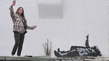 Banksy claims Bayswater artwork that shows two figures lying down