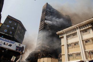 Scots priest loses three brothers in Nigeria tower block fire that killed 12
