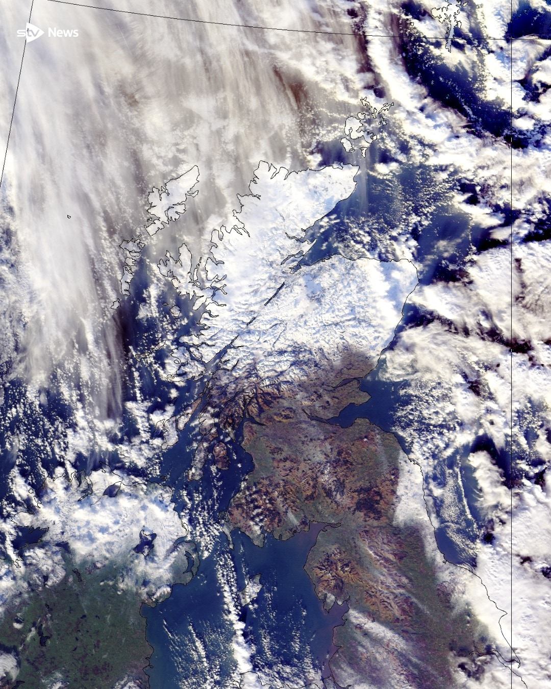 Satellite images show the north of Scotland turned white by snow.