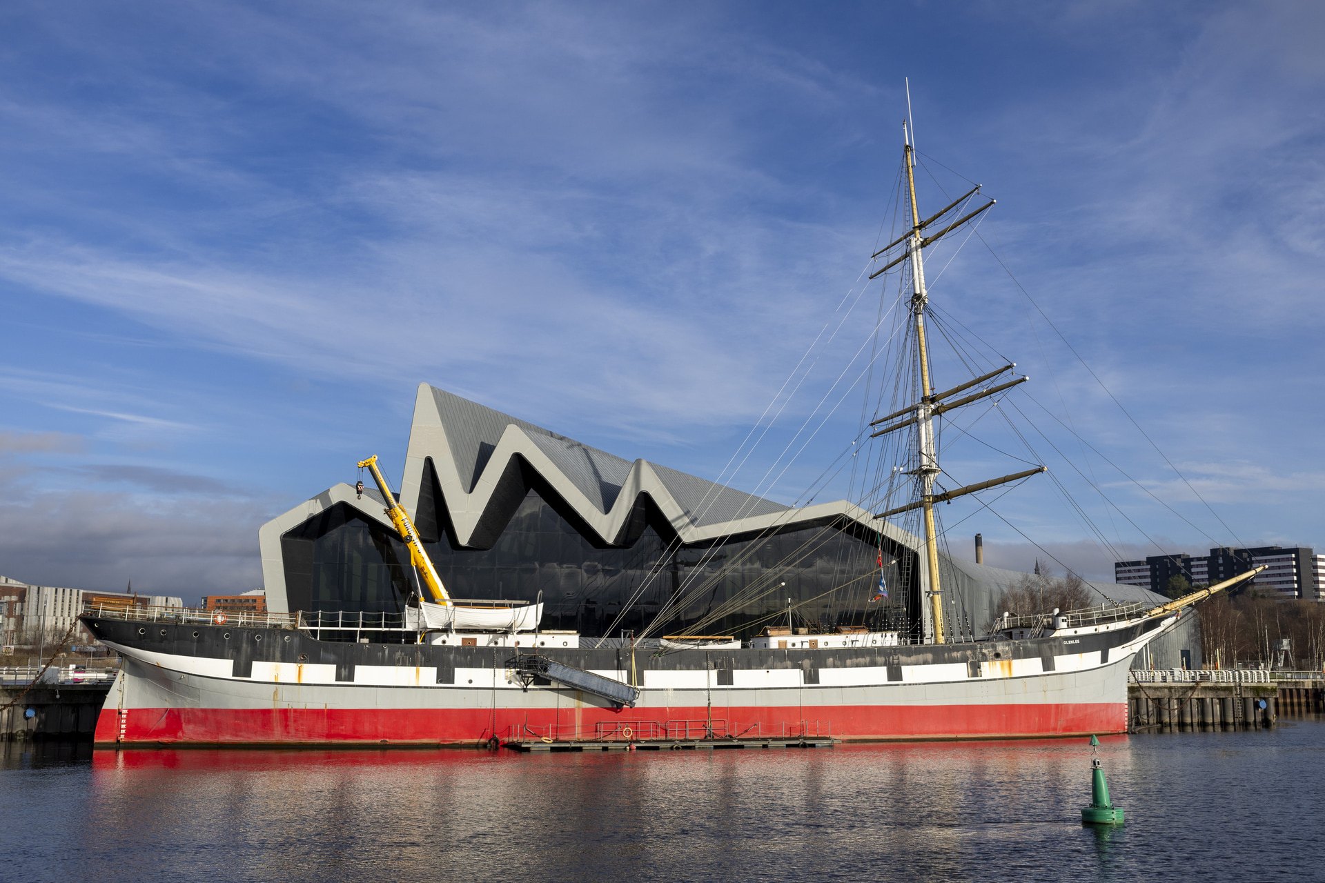 The Tall Ship Glenlee with its one remaining mast t The Riverside Museum in Glasgow.