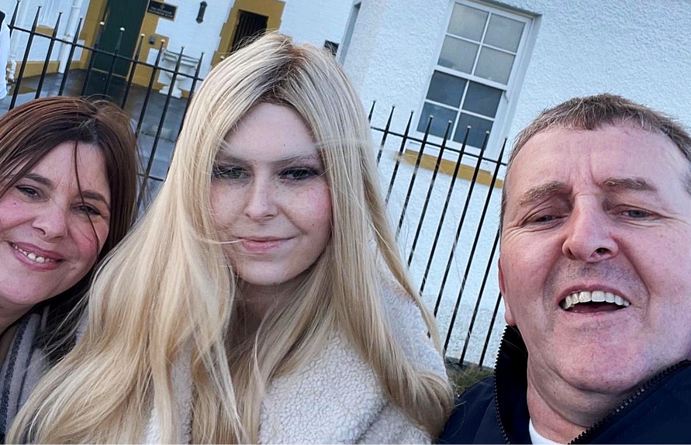 Michelle and Mark Sneddon (left and right) are fighting for urgent reform after their daughter, Isla, (centre) died of cancer last year.