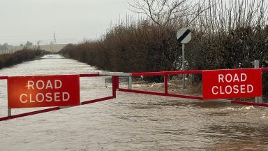Roads flooded and train speed restricted as heavy rain batters Scotland