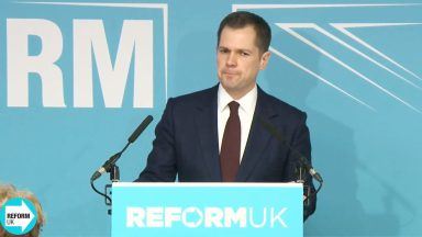 Robert Jenrick defects to Nigel Farage’s Reform UK after Tory sacking