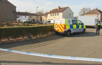 Gunman filmed firing live rounds into flat window  amid gang war jailed