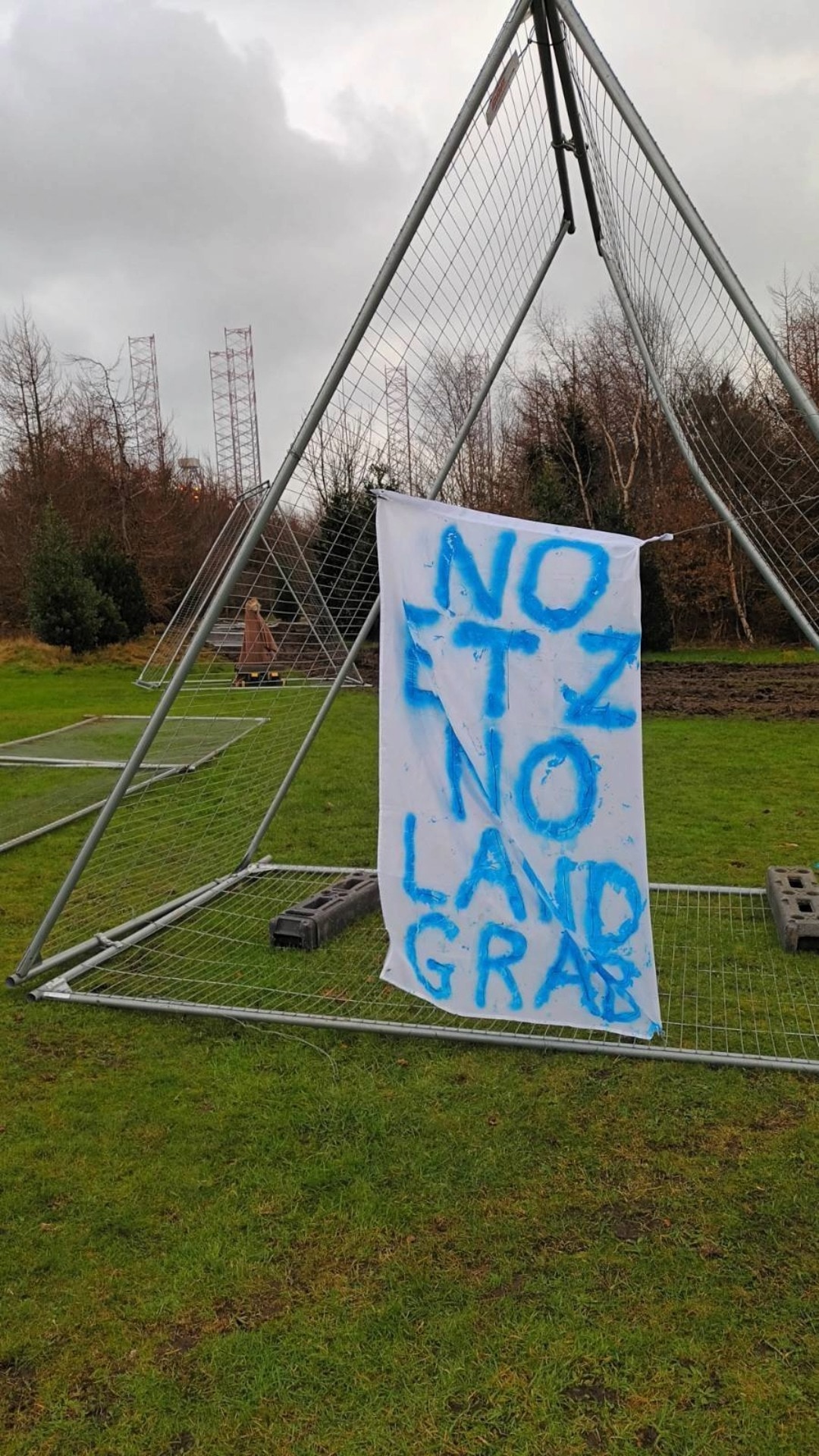 Activists removed barrier fencing and posted signs across the site.
