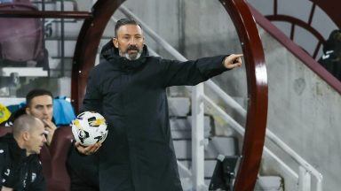 Derek McInnes proud of Hearts resilience to win after Beni Baningime red card