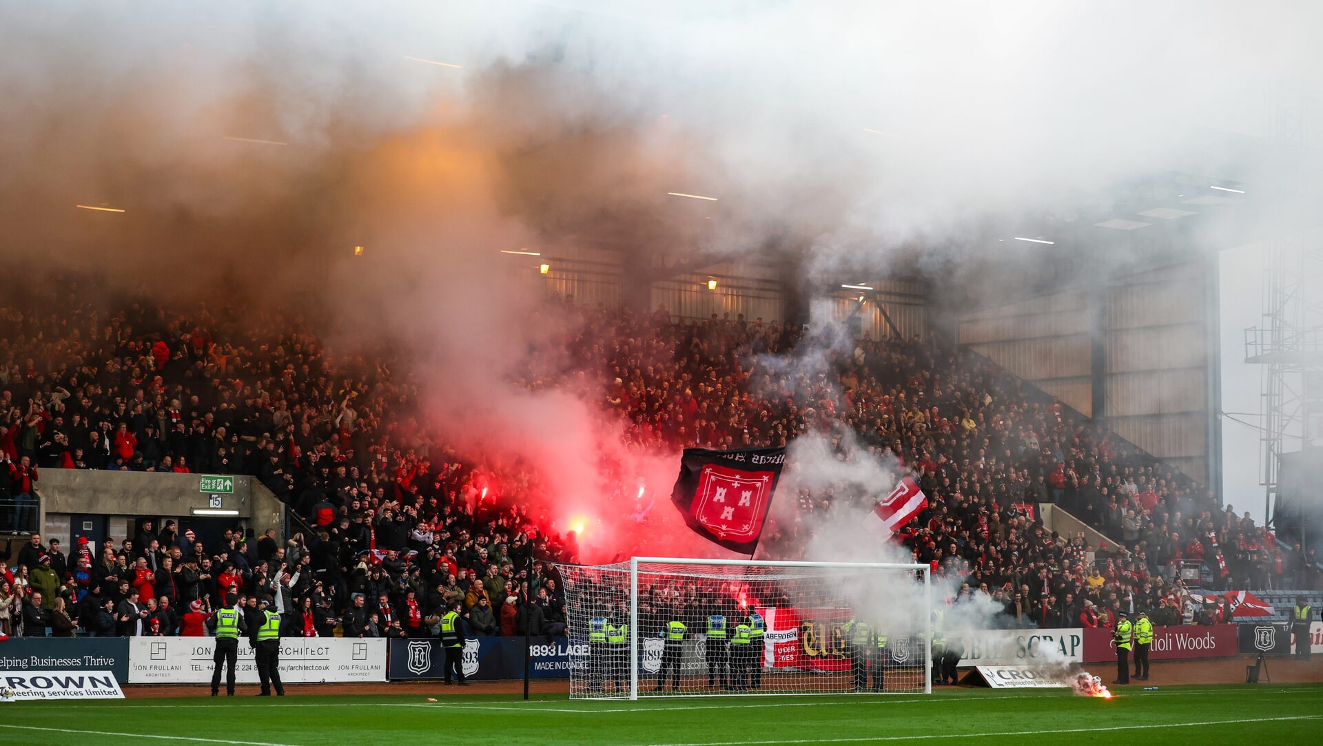 Pyrotechnics at a Dundee v Aberdeen game caused caused a burn injury to a child as well as respiratory issues for another supporter.
