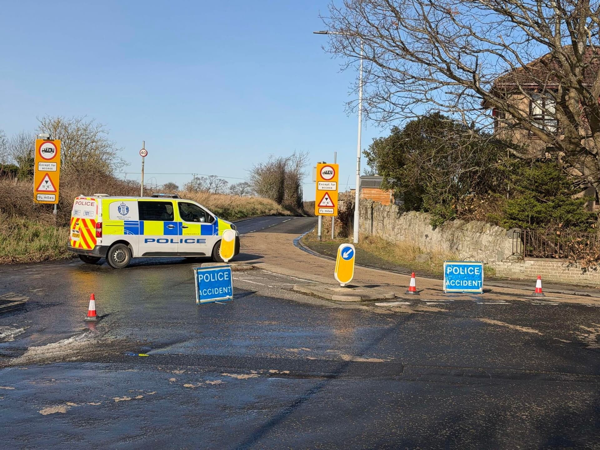 The road has been closed to allow for vehicle recovery.