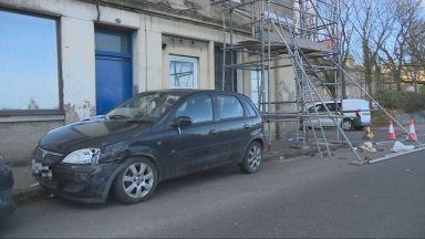 Road closed in Edinburgh after car crashes into parked vehicles and scaffolding