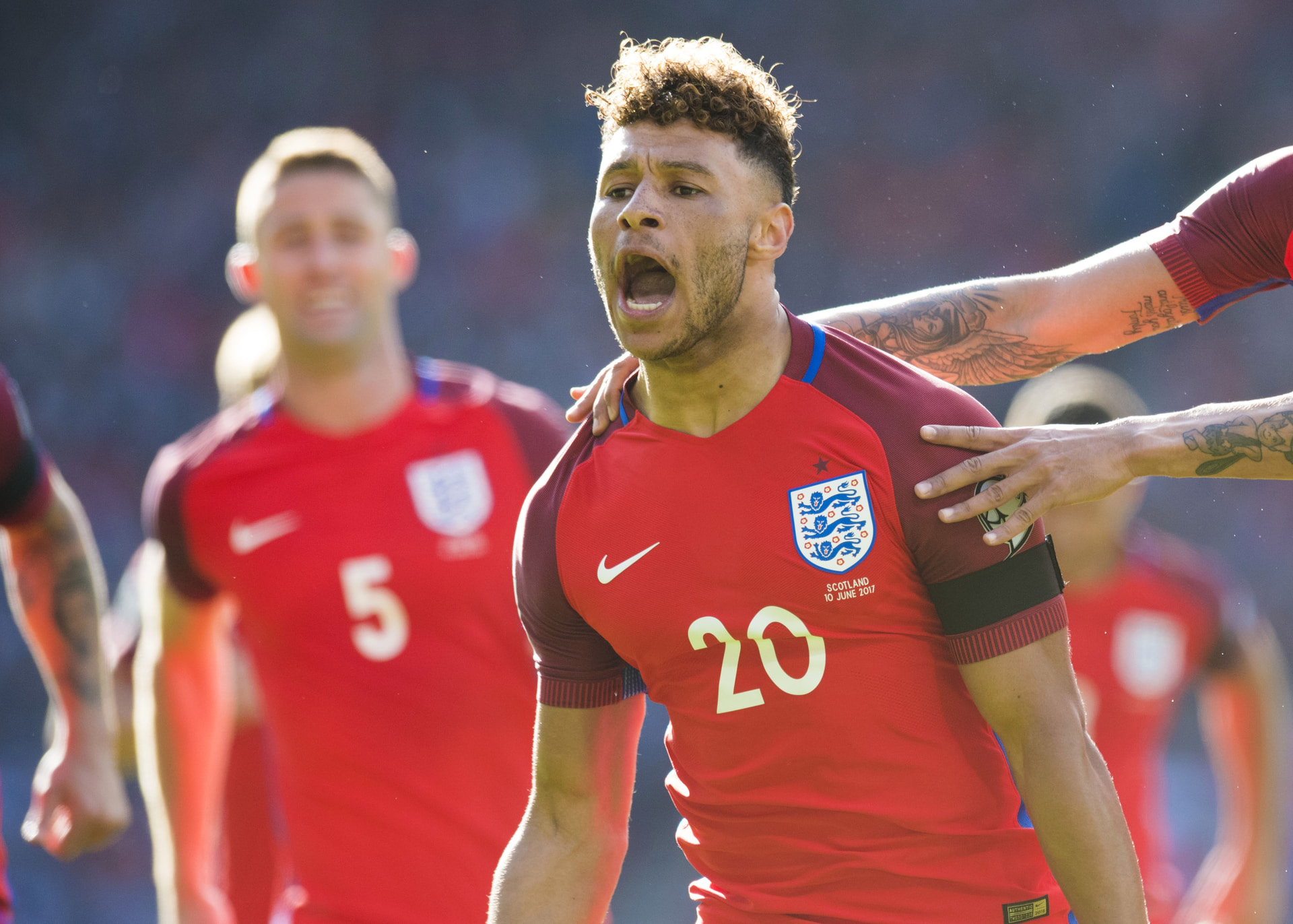 England's Alex Oxlade-Chamberlain celebrates giving England the lead at Hampden Park against Scotland.
