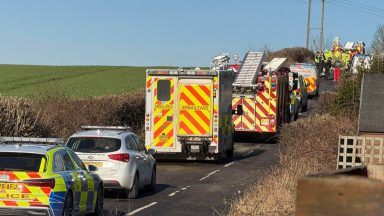 Woman taken to hospital after two-vehicle crash on Fife road