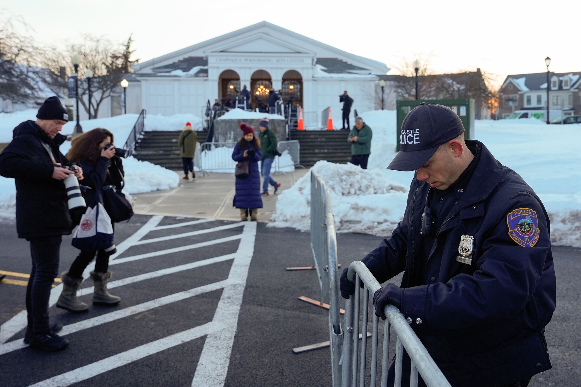 A police officer sets up barricades outside the Chappaqua Performing Arts Centre