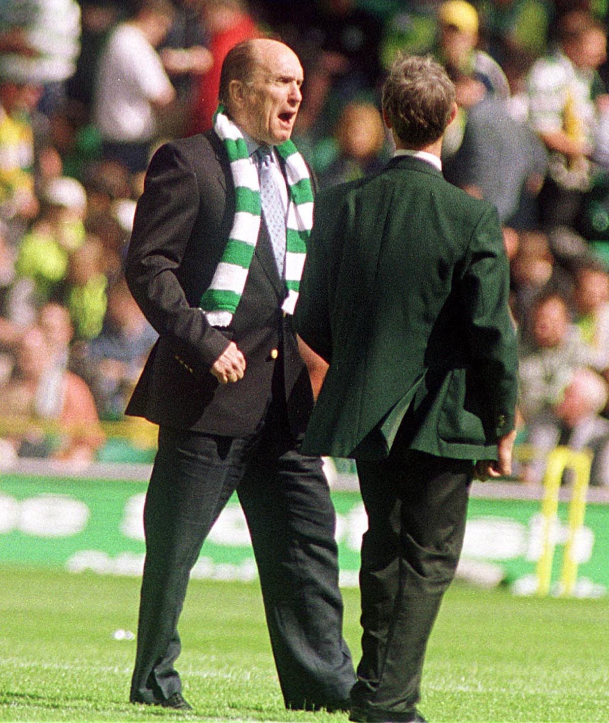 Robert Duvall soaks up the atmosphere at half-time between Celtic and Leeds at Parkhead in 1999.