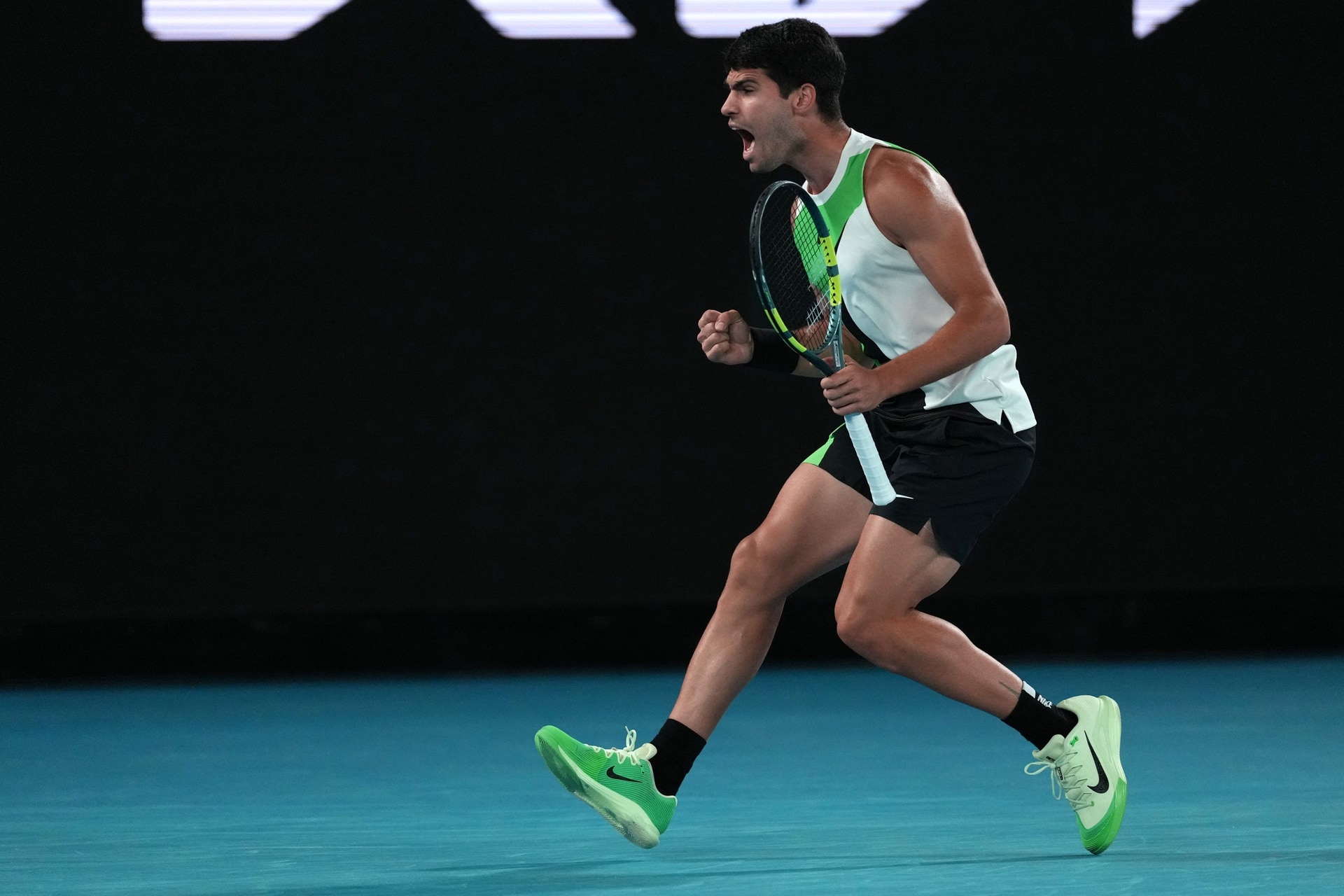 Carlos Alcaraz celebrates winning a key point (Dita Alangkara/AP)