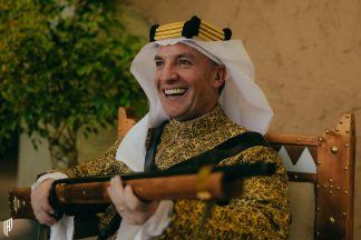 Ex Celtic manager Brendan Rodgers poses with gun wearing traditional Saudi dress 