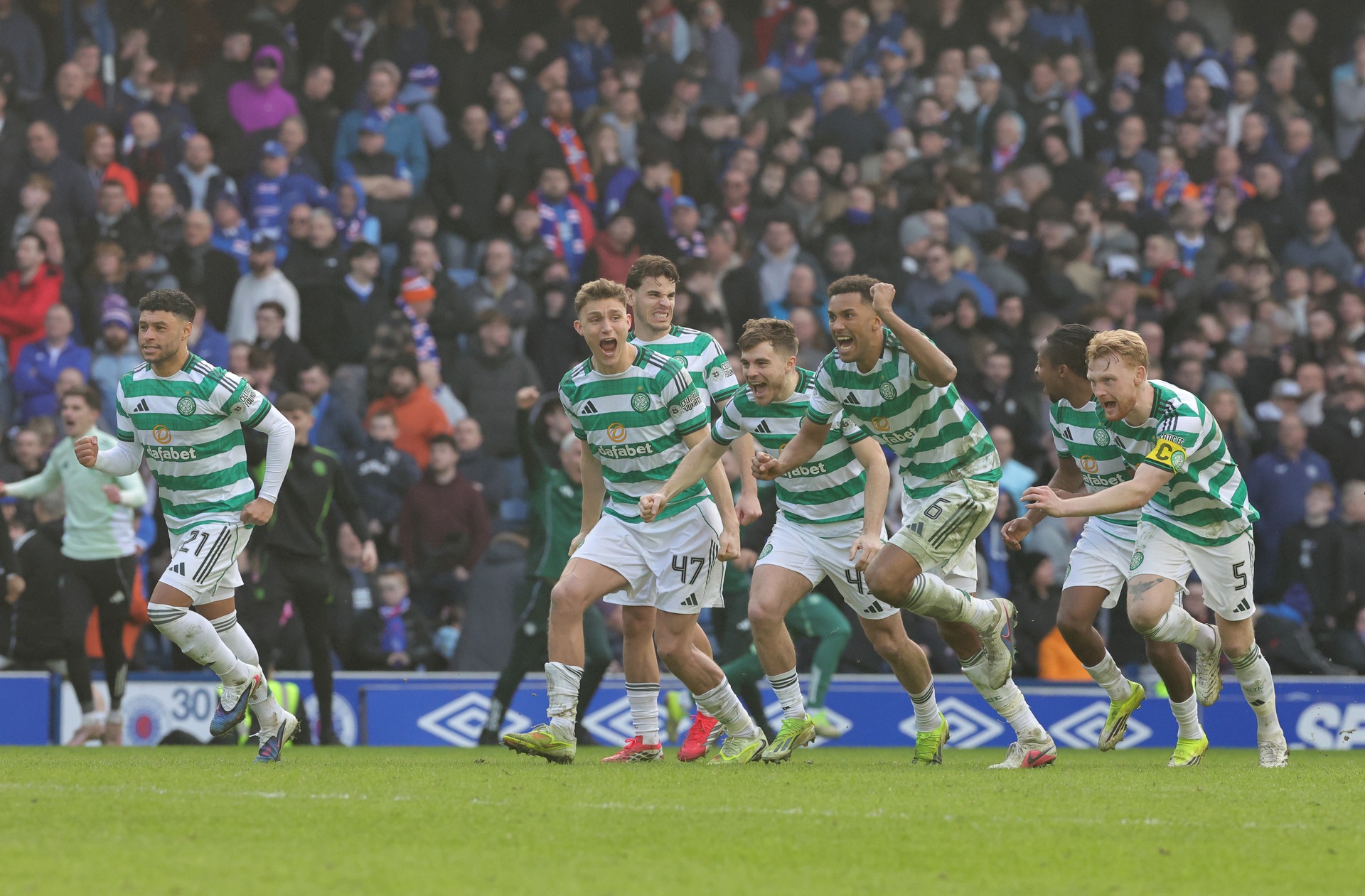 Celtic's players celebrate after their team mate Tomas Cvancara (not pictured) scored the winning penalty following a shoot out after the Scottish Gas Men's Scottish Cup quarter-final match at Ibrox Stadium, Glasgow. Picture date: Sunday March 8, 2026.