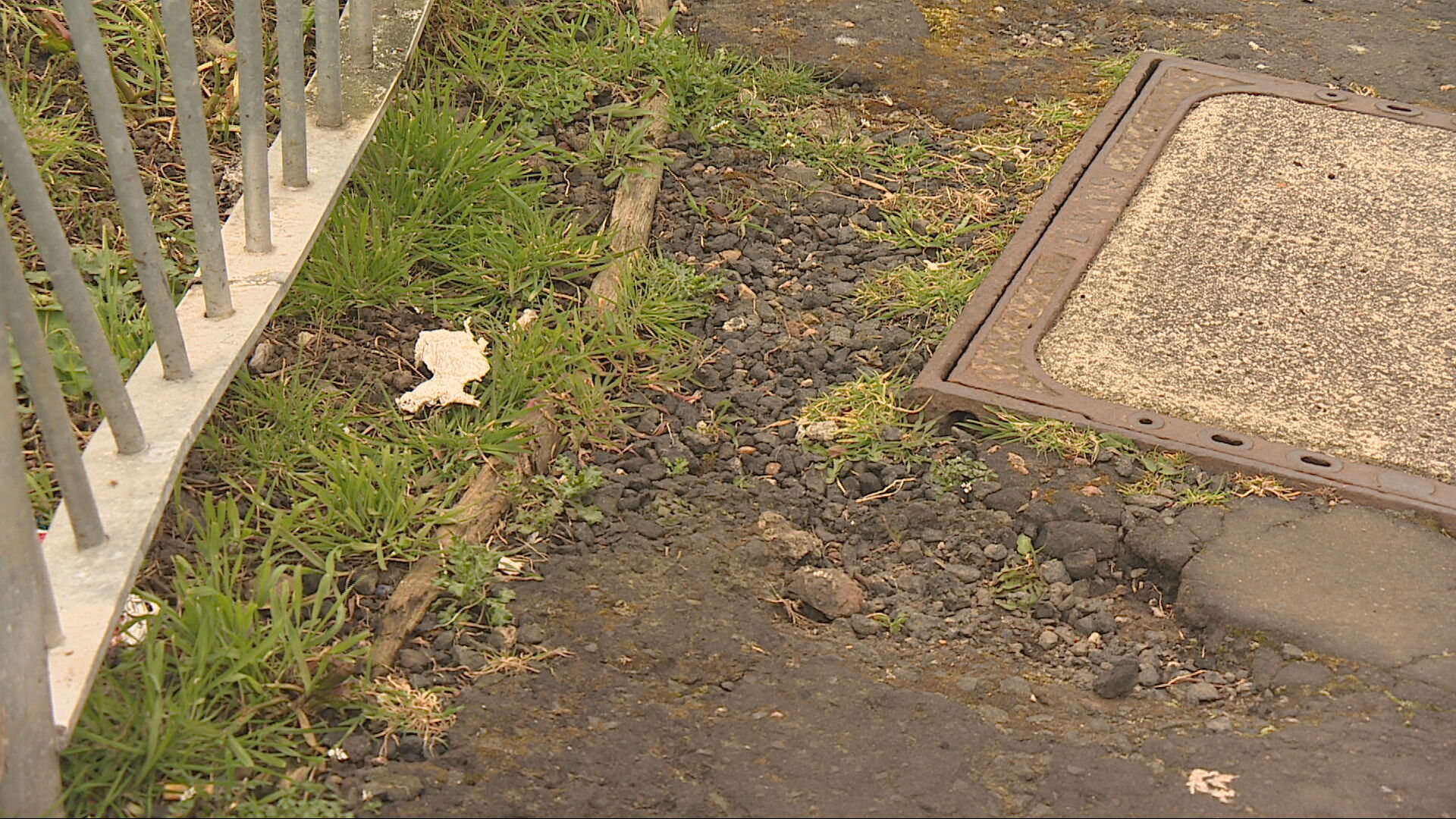 Gravel-filled cracks and holes in the pavements
