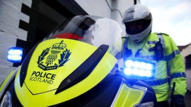 Hunt for balaclava-wearing suspect after man hit with hammer and robbed in Livingston