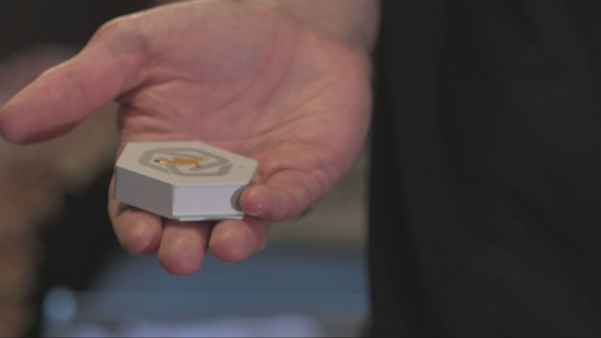 The suit uses electrical stimulation to relax muscles and improve coordination.