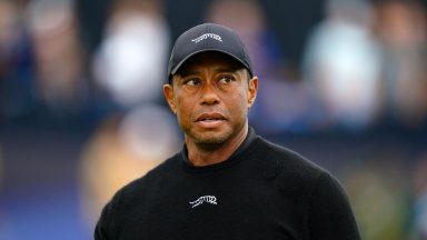 Tiger Woods told officers he was looking at phone before crash – police report