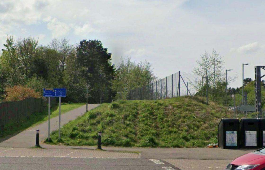 Hunt for suspect in balaclava after man hit with hammer and robbed near Livingston railway line