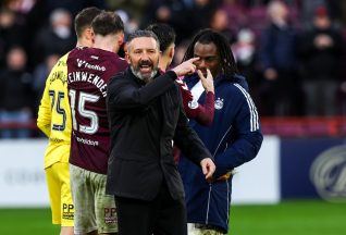 Derek McInnes insists Premiership leaders Hearts are keeping feet on ground