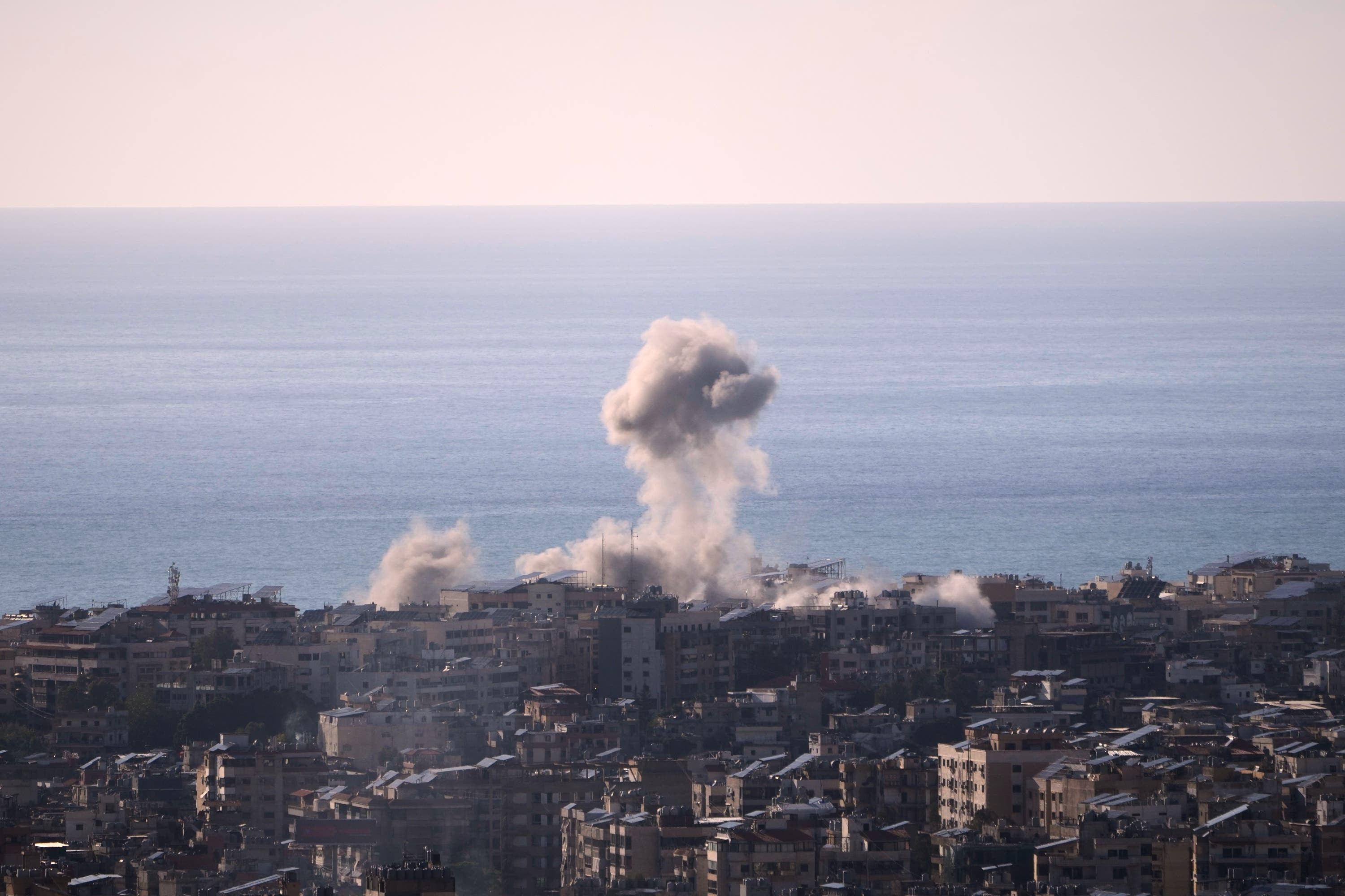 Smoke rises following an Israeli air strike on a building near the airport road in Beirut, Lebanon