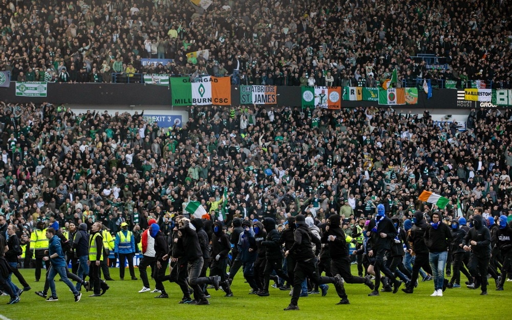 Fans invade pitch at Ibrox