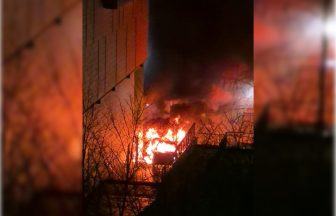 Car torched after ramming into Livingston shopping centre in armed gang robbery