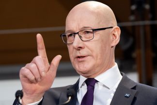 SNP plan for NHS is working, says Swinney