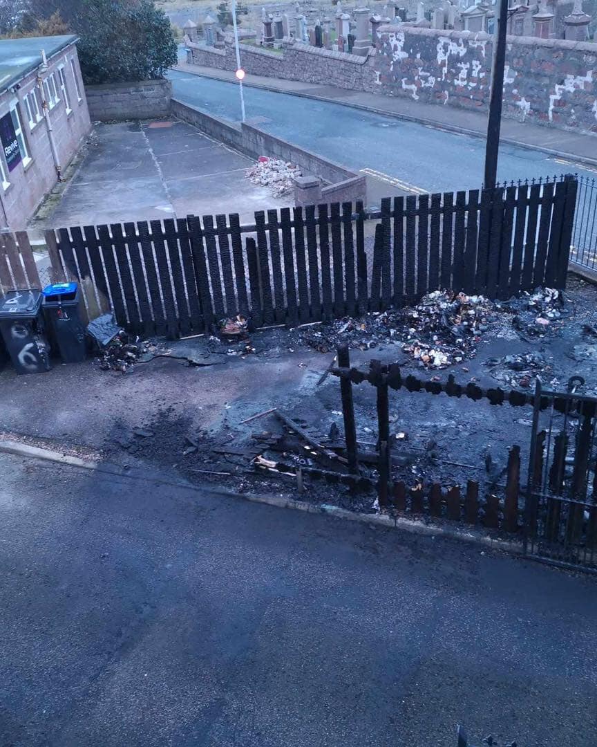 The fire took hold in a bin storage area opposite Peterhead Cemetery.