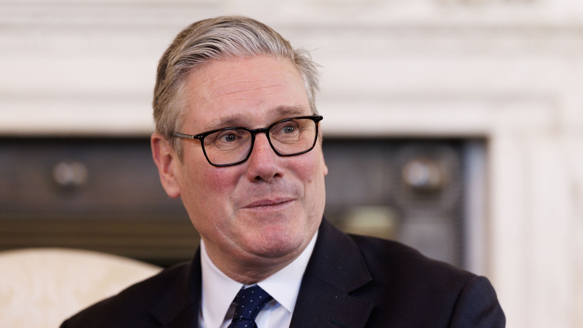 Sir Keir Starmer is facing calls to stop the planned passport price rise