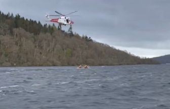 Helicopter helps rescue three trapped on sinking boat in Loch Lomond