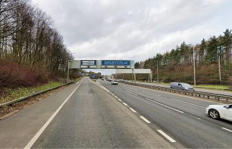 Police officer hit with own car on M8 at Paisley while stopping to help breakdown