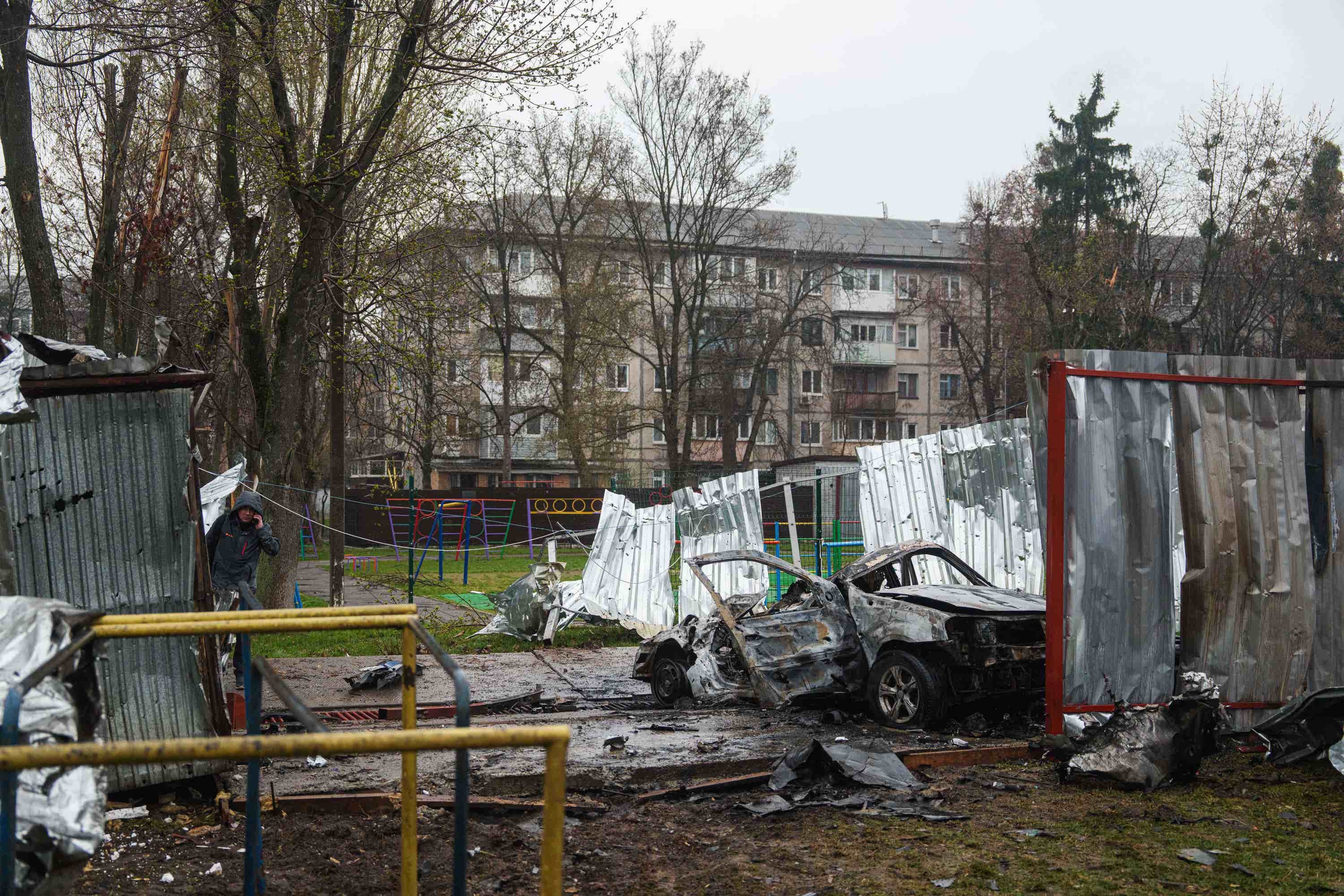 A destroyed car is seen after a Russian strike on a residential neighbourhood in Vyshneve in the Kyiv region