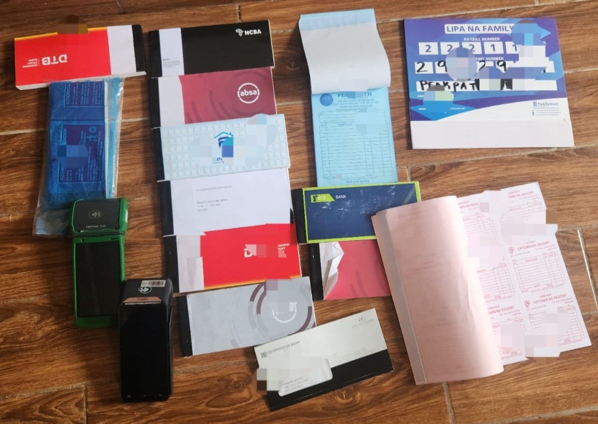A search at the residence led to the recovery of stolen items, including an HP laptop, mobile phones, assorted foreign currencies, multiple credit cards, cheque books from various banks and PDQ machines.