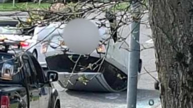 Teenager arrested after car flipped on roof in Aberdeen