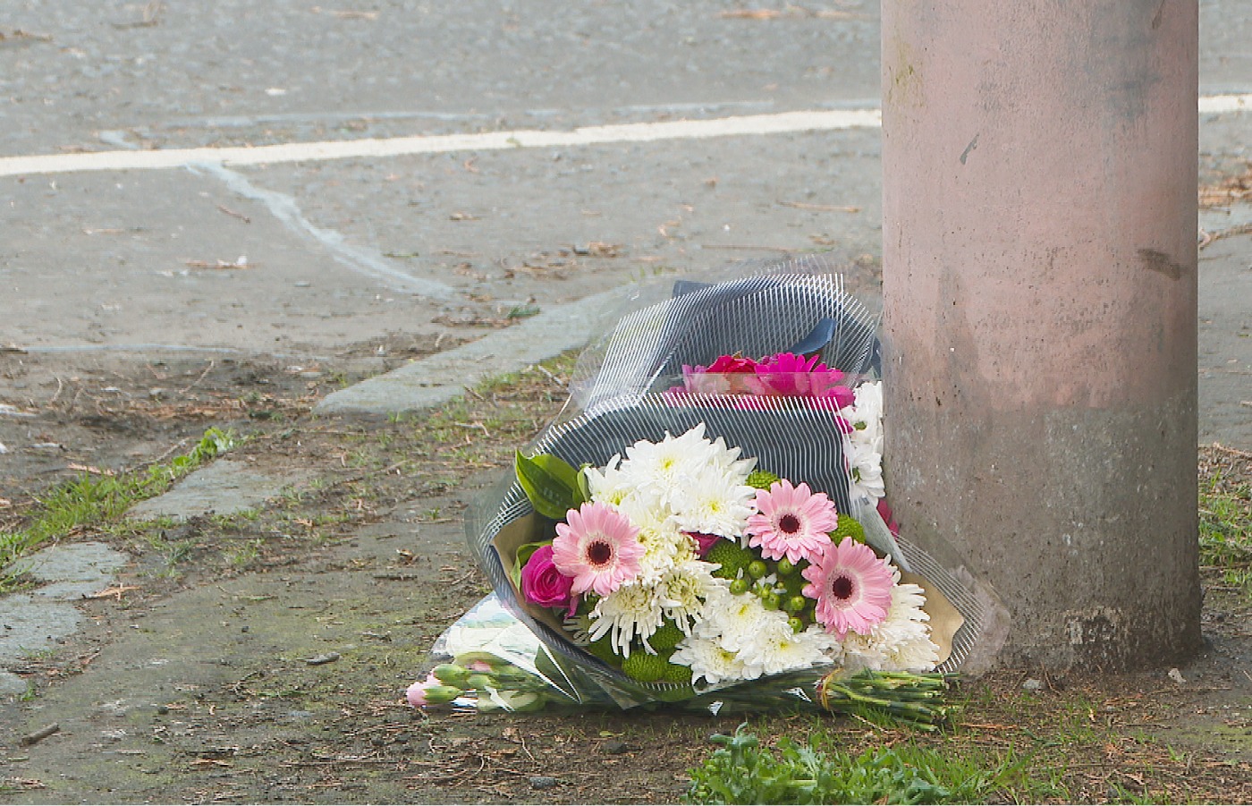 Flowers left on Cardowan Road, Glasgow.