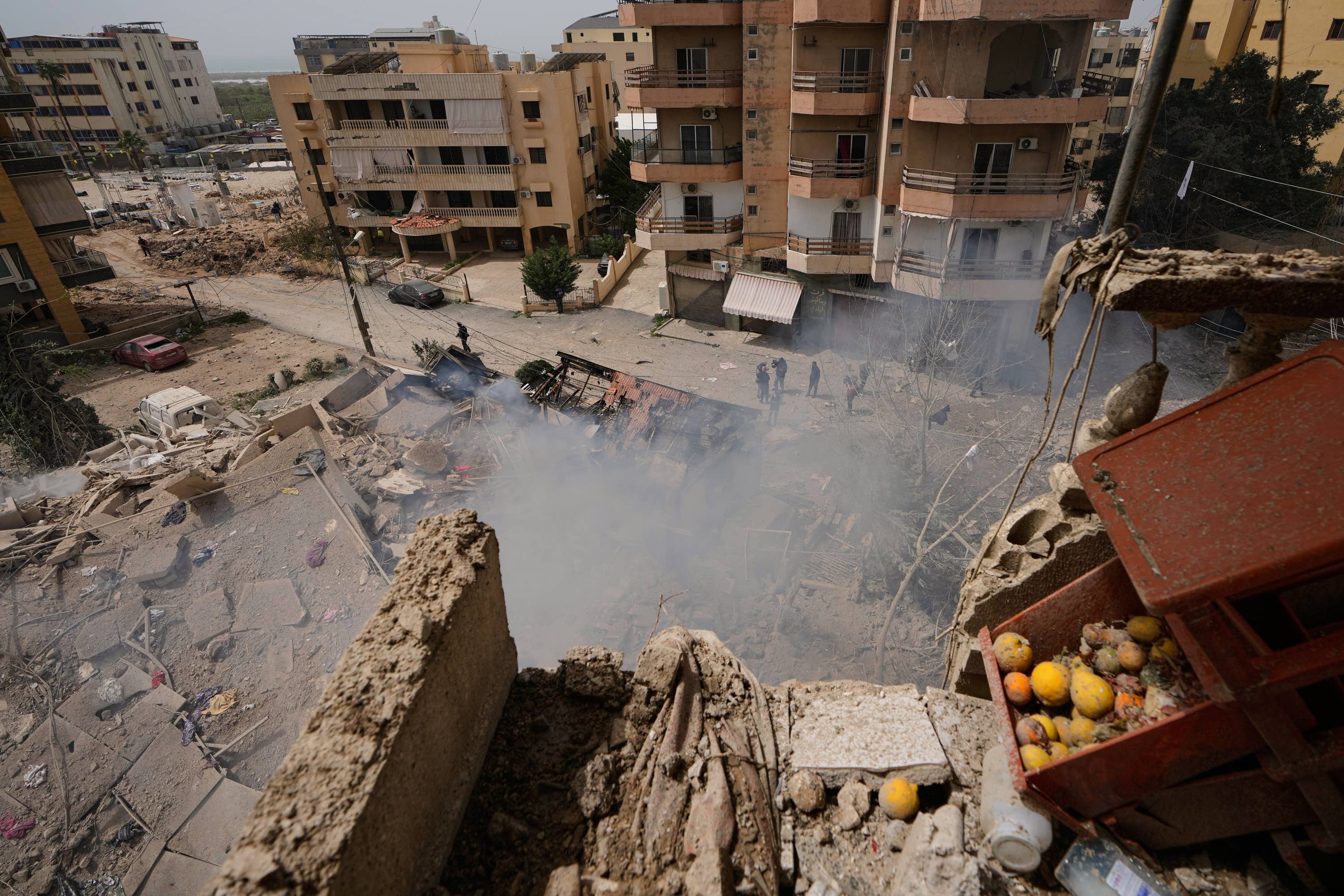 Smoke rises from a building destroyed in an Israeli airstrike in the southern port city of Tyre, Lebanon (Mohammed Zaatari/AP)